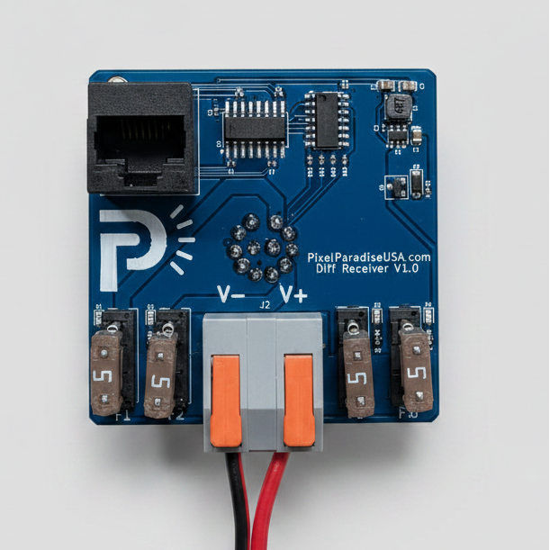 A blue electronic DIY receiver board by PixelParadeUSA, featuring a RJ45 port, terminal blocks, and a red/orange connector, placed on a light wood background.